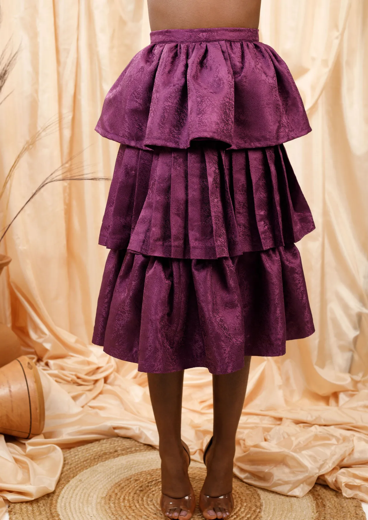 Aya Morrison Selali Layered Skirt with a deep purple hue and three ruffled layers