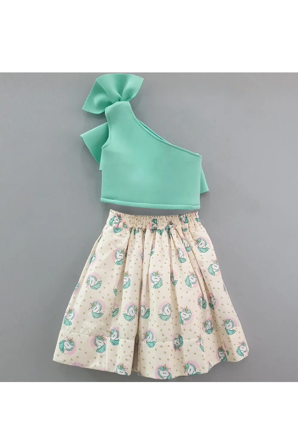 One shoulder top with unicorn printed skirt and hair clip