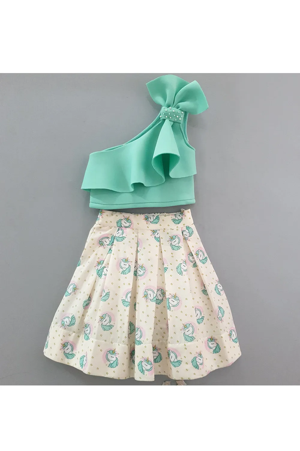 One shoulder top with unicorn printed skirt and hair clip