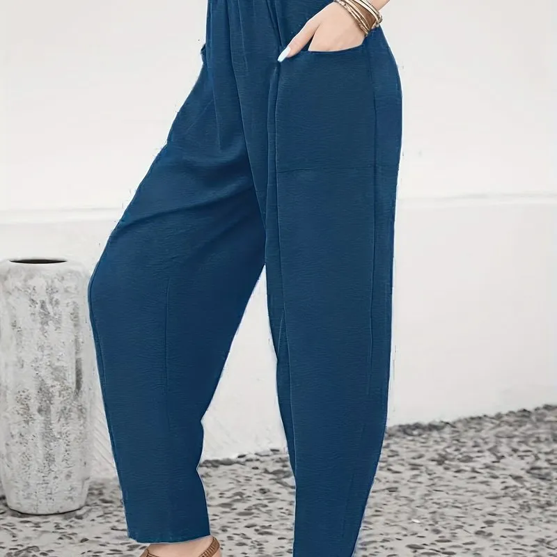 Plus Size Solid High Rise Tapered Leg Trousers - Comfort Meets Style with Convenient Pockets